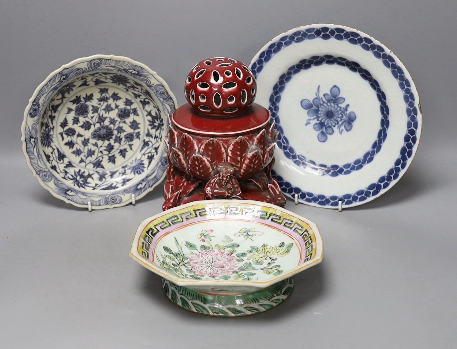 A Chinese sang-de-boeuf glazed pottery incense burner, 21cm high, similar blue and white bowl and a famille rose footed dish together with a Delft plate.